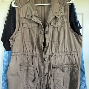 Utility Vest with drawstring, zip, and buttons